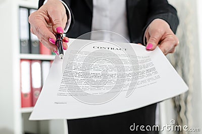 Businesswoman submitting a contract Stock Photo