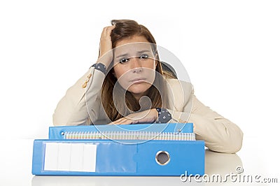 Businesswoman suffering stress and headache at office desk looking worried depressed and overwhelmed Stock Photo