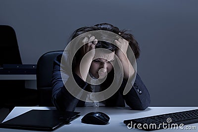 Businesswoman tearing her hair out Stock Photo