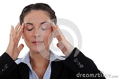 Businesswoman with a headache Stock Photo