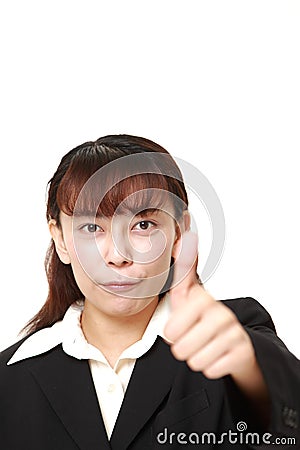 businesswoman with thumbs up gesture Stock Photo