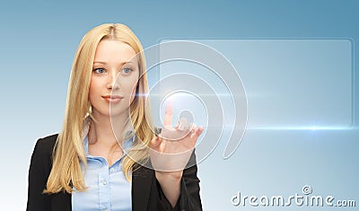 Businesswoman touching virtual screen Stock Photo