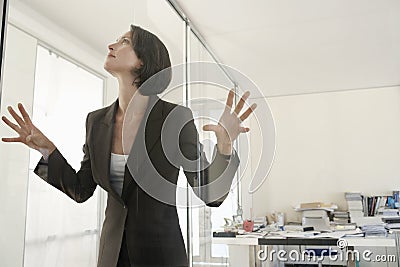 Businesswoman Trapped In Office Stock Photo