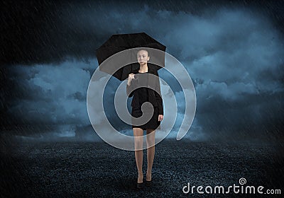 Businesswoman with umbrella Stock Photo