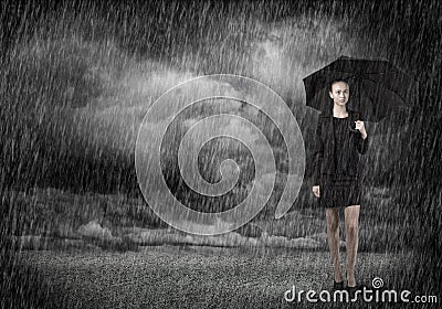 Businesswoman with umbrella Stock Photo