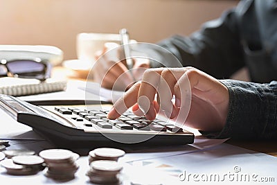 businesswoman using calculator for calculate finance accounting Stock Photo