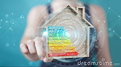 Businesswoman using 3D rendering energy rating chart in a wooden Stock Photo