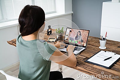Businesswoman Video Conferencing On Computer Stock Photo