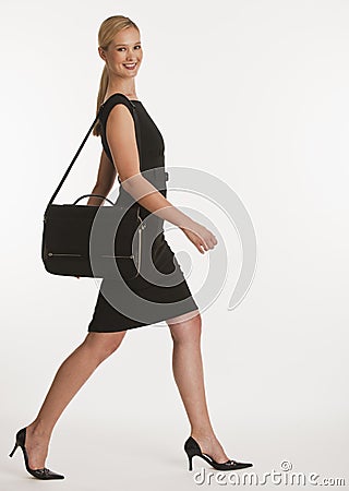 Businesswoman walking Stock Photo