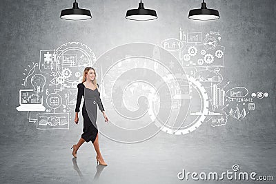 Businesswoman walking in office room, financial analysis sketch on concrete wall Stock Photo