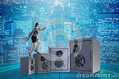 The businesswoman walking on top of safe Stock Photo