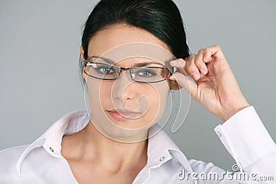 Businesswoman wearing eyeglasses Stock Photo