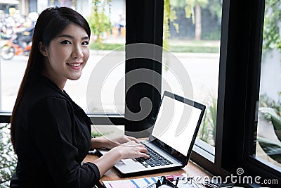 Businesswoman work with laptop at office. business person use co Stock Photo