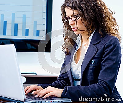 Businesswoman working on computer Stock Photo