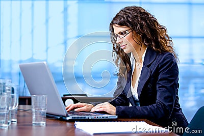 Businesswoman working on computer Stock Photo