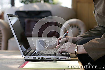Businesswoman Working on a Laptop Computer Stock Photo
