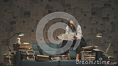 Businesswoman working on the sofa late at night Stock Photo