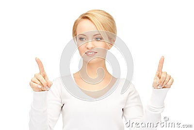 Businesswoman working with something imaginary Stock Photo