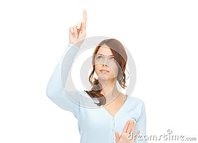 Businesswoman working with something imaginary Stock Photo