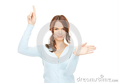 Businesswoman working with something imaginary Stock Photo