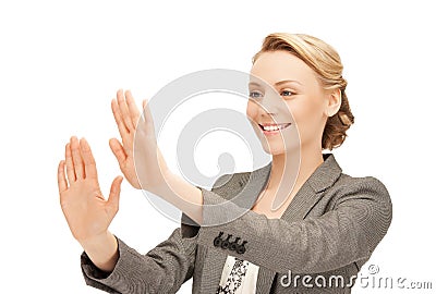 Businesswoman working with something imaginary Stock Photo