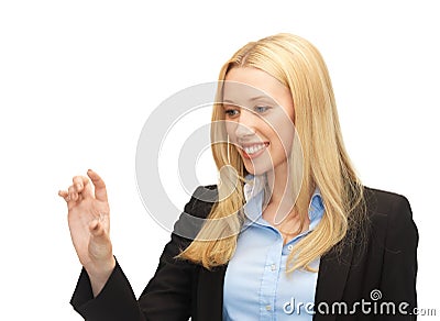 Businesswoman working with something imaginary Stock Photo