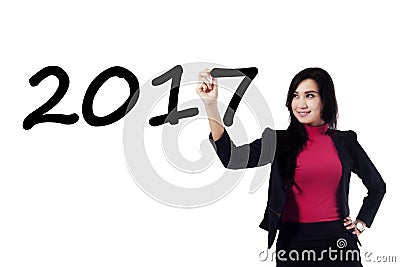 Businesswoman writing number 2017 Stock Photo