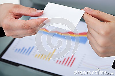 Businesswomen Exchanging Business Card Stock Photo