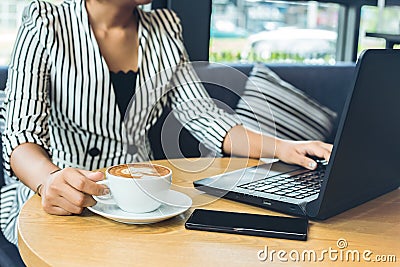 Businesswomen hold cup of coffee. Stock Photo