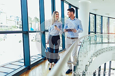 Businesswomen hold luggage travel to business trip Stock Photo