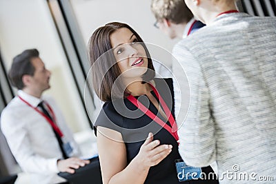 Businesswomen talking during coffee break at convention center Stock Photo