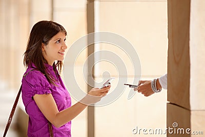 Businesswomen using bluetooth connection Stock Photo