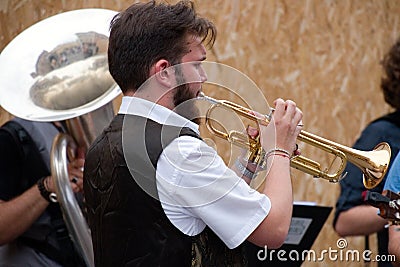 Busker Festival 2016 musician playing the trumpet Editorial Stock Photo