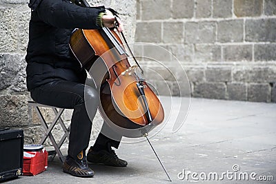 Busker playing the cello Stock Photo