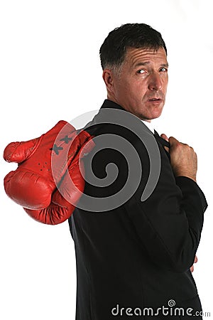 Bussines man with boxing gloves on Stock Photo