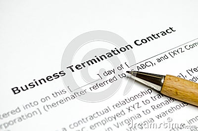 Bussines termination contract with wooden pen Stock Photo