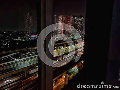 Bussy city in the night toll road Stock Photo