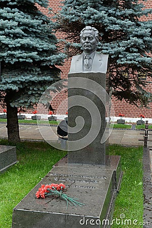 Bust of the General Secretary of the CPSU Central Committee Konstantin Chernenko on the grave at the Kremlin Wall on Red Square in Editorial Stock Photo