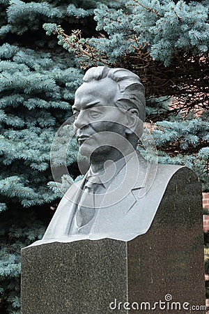 Bust of the General Secretary of the CPSU Central Committee Konstantin Chernenko on the grave at the Kremlin Wall on Red Square in Editorial Stock Photo