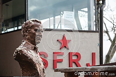 Bust of Marshal Josip broz Tito in front of a SFRJ Socialist Yugoslavia red star. Editorial Stock Photo