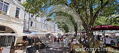 Bustling restaurants at the quay of La Rochelle, France Editorial Stock Photo