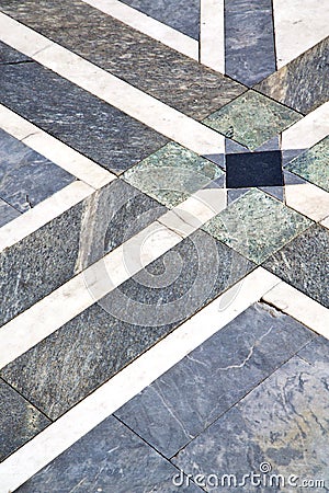 busto arsizio street abstract pavement of a curch ymarble Stock Photo