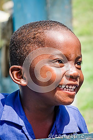 Portrait of unidentified young African boy laughing Editorial Stock Photo