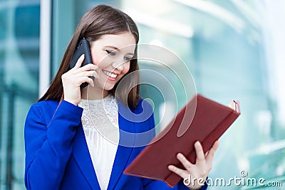 Busy businesswoman at work Stock Photo