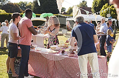 Busy Cake Stall At Summer Garden Fete Stock Photo