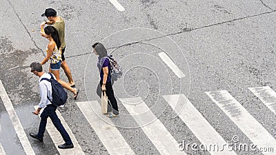 Busy city people move to pedestrian crosswalk on business Editorial Stock Photo