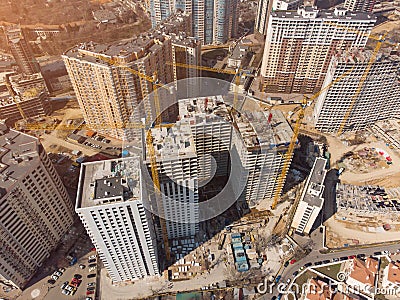 Busy Construction Site and Construction Equipment Aerial Photo at sunset Editorial Stock Photo