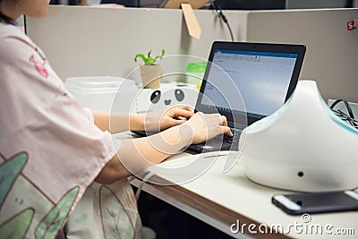 pump breastmilk and send email in office Stock Photo