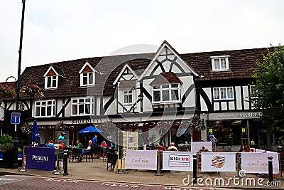 A busy street with shops in East Grinstead Sussex. Editorial Stock Photo