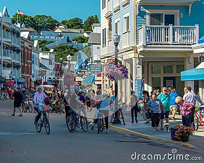 Busy streets of downtown Mackinac Island Michigan filled with tourists Editorial Stock Photo